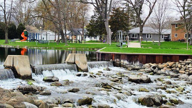 556 Gold St, Green Lake, WI 54941 - dock area featuring a yard and a water view