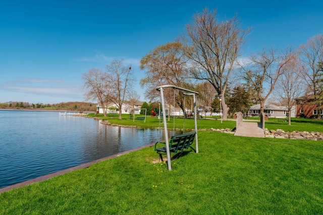 556 Gold St, Green Lake, WI 54941 - view of home's community featuring a water view and a yard