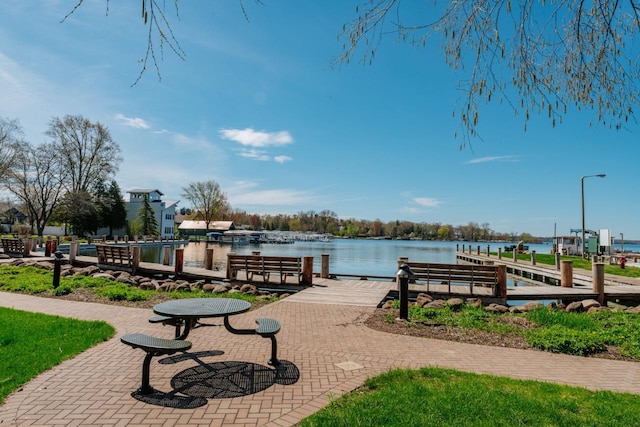556 Gold St, Green Lake, WI 54941 - view of home's community with a boat dock and a water view