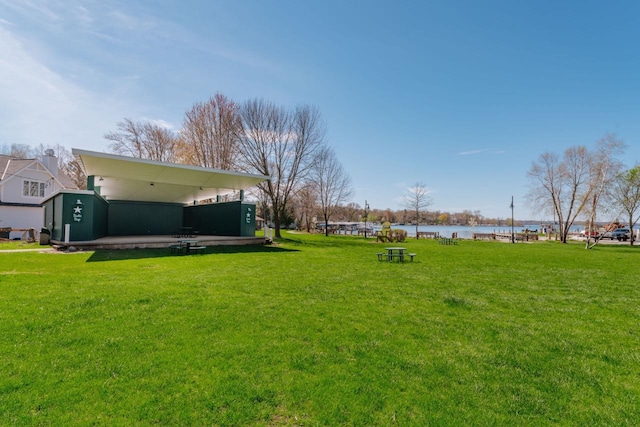 556 Gold St, Green Lake, WI 54941 - view of green lawn featuring a water view