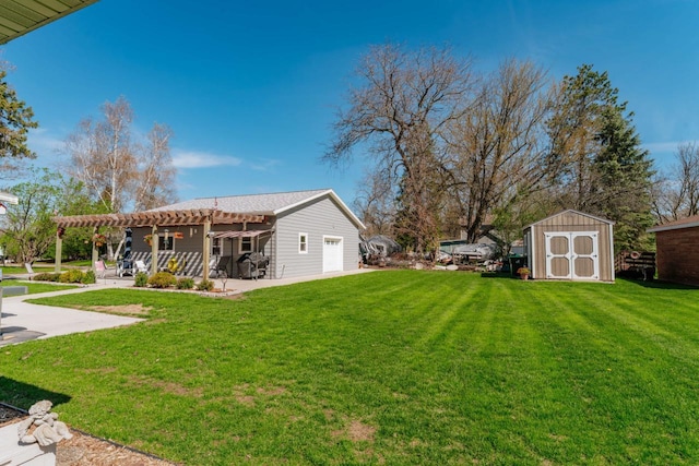 556 Gold St, Green Lake, WI 54941 - view of grassy yard featuring a pergola, a storage unit, a patio, and an outbuilding