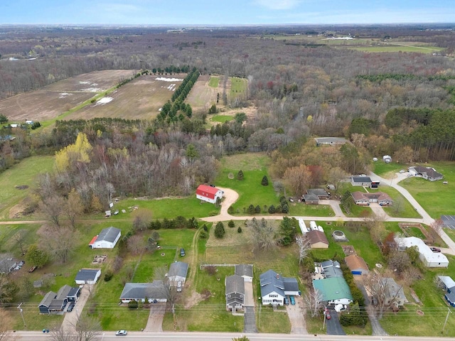 aerial view with a wooded view