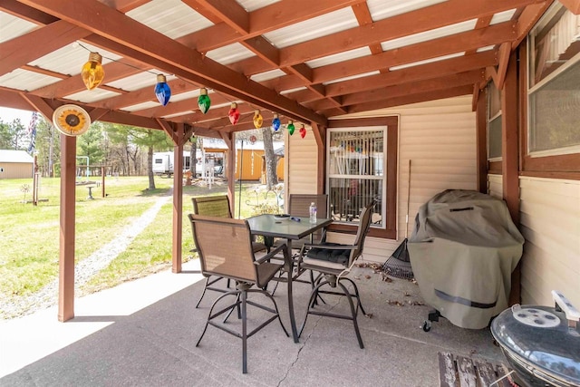 976 Blackhawk Ct, Hancock, WI 54943 - view of patio / terrace with grilling area and outdoor dining space