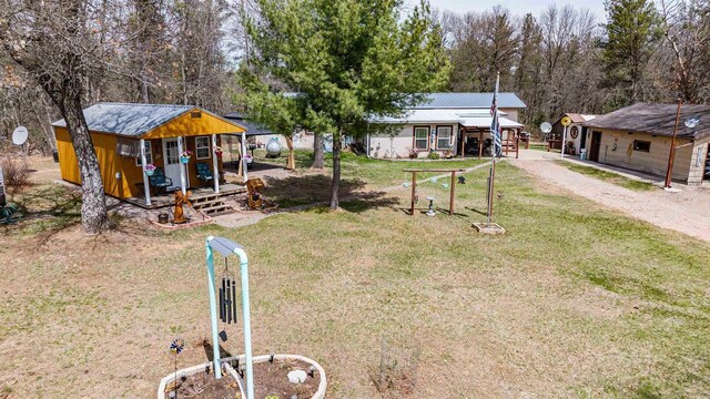 976 Blackhawk Ct, Hancock, WI 54943 - view of yard featuring an outbuilding and dirt driveway