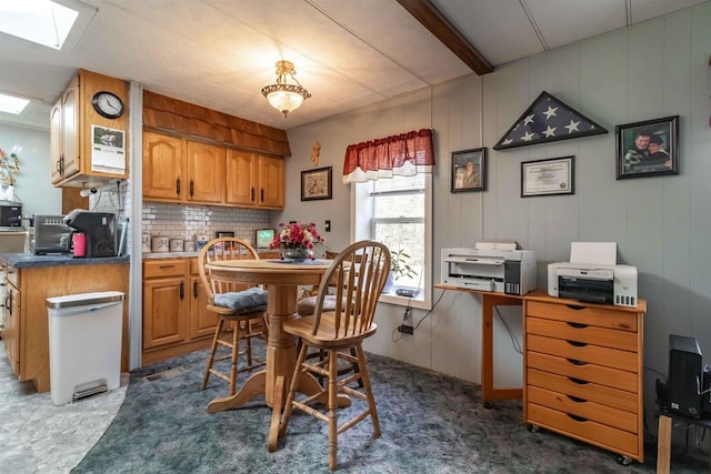 976 Blackhawk Ct, Hancock, WI 54943 - dining space featuring a skylight and beamed ceiling
