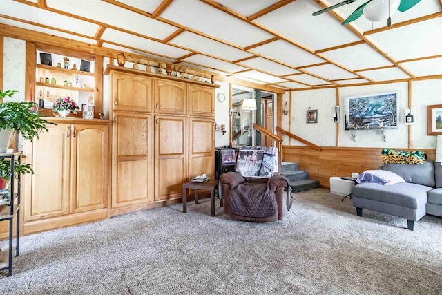 976 Blackhawk Ct, Hancock, WI 54943 - living area with stairway, carpet, and a ceiling fan