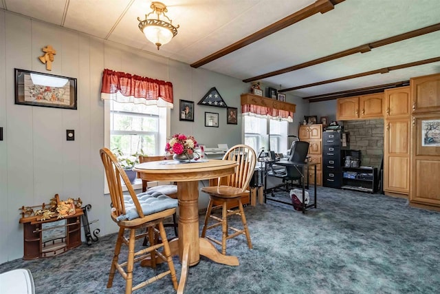 976 Blackhawk Ct, Hancock, WI 54943 - dining room with plenty of natural light, beam ceiling, and dark colored carpet