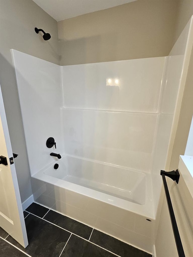 bathroom with shower / bathtub combination and tile patterned floors