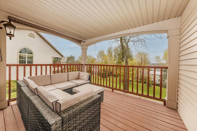 deck with an outdoor hangout area
