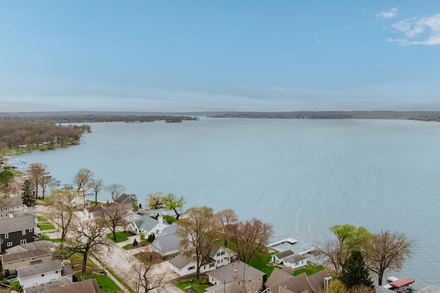 aerial view featuring a water view and a residential view