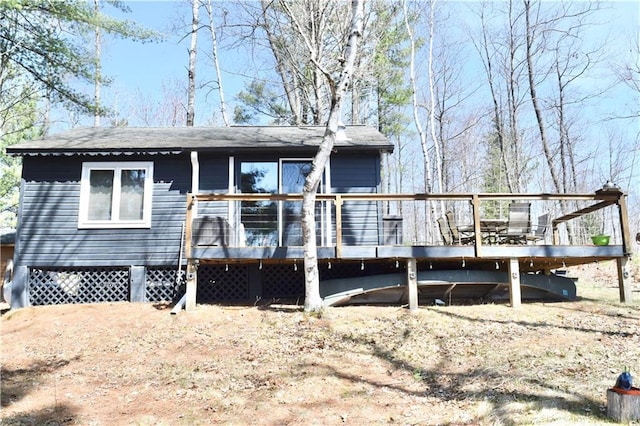 rear view of property with a deck
