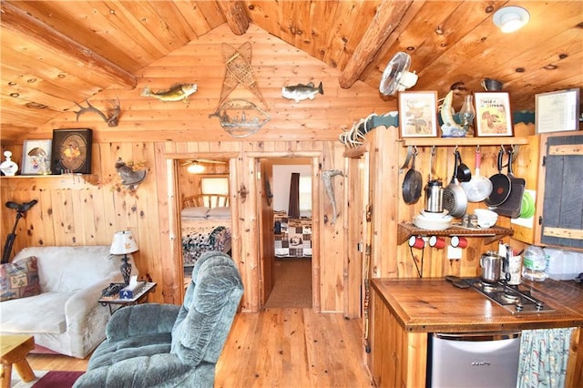 interior space featuring lofted ceiling with beams, wood ceiling, wooden walls, and hardwood / wood-style floors