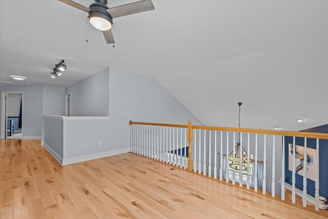 630 Polaris St, West Bend, WI 53095 - bonus room featuring baseboards, ceiling fan, and wood finished floors