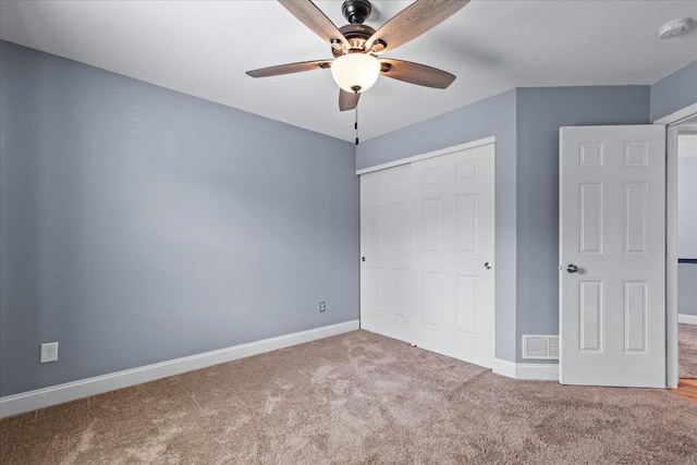 630 Polaris St, West Bend, WI 53095 - unfurnished bedroom featuring carpet floors, a ceiling fan, baseboards, visible vents, and a closet