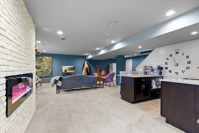 630 Polaris St, West Bend, WI 53095 - bedroom featuring indoor wet bar, recessed lighting, visible vents, and light colored carpet