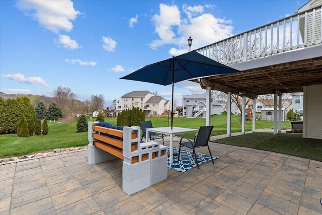 630 Polaris St, West Bend, WI 53095 - view of patio / terrace featuring a residential view, outdoor dining space, and a deck