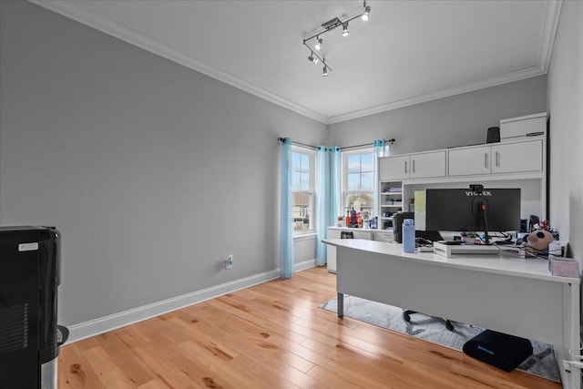 630 Polaris St, West Bend, WI 53095 - office with rail lighting, light wood-style floors, and crown molding
