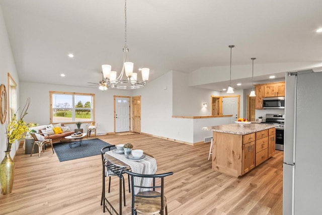 kitchen featuring recessed lighting, light wood-style floors, and appliances with stainless steel finishes