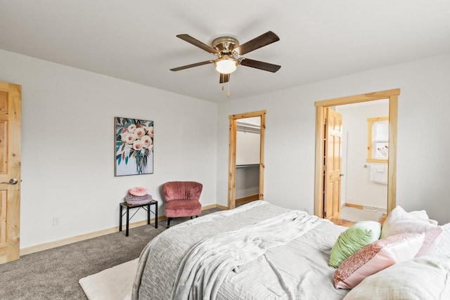 carpeted bedroom featuring baseboards, connected bathroom, and ceiling fan