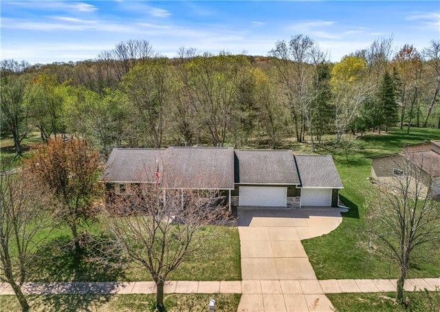 323 Hewitt St, Eau Claire, WI 54701 - view from above of property featuring a heavily wooded area