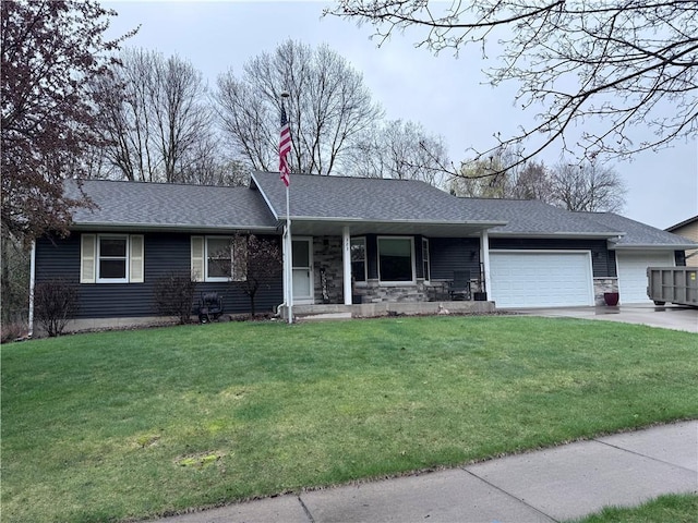 323 Hewitt St, Eau Claire, WI 54701 - single story home with covered porch, an attached garage, a shingled roof, and a front yard