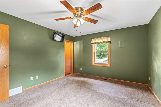 323 Hewitt St, Eau Claire, WI 54701 - carpeted empty room featuring baseboards and ceiling fan