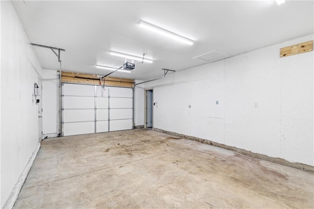 323 Hewitt St, Eau Claire, WI 54701 - garage featuring a garage door opener