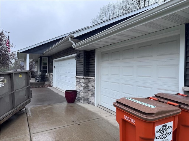 323 Hewitt St, Eau Claire, WI 54701 - garage featuring concrete driveway