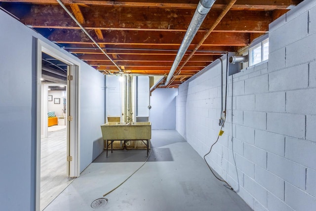 basement featuring a sink