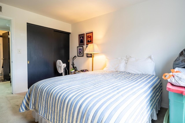 bedroom featuring carpet and visible vents