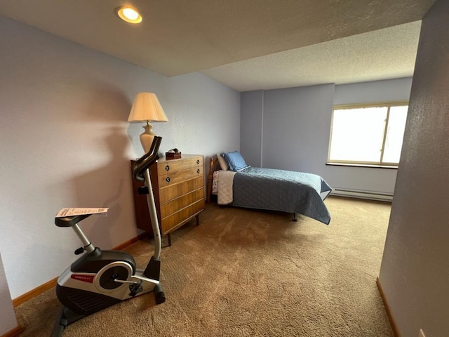 bedroom featuring a baseboard radiator and carpet