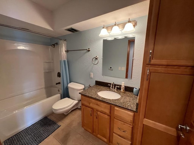 bathroom featuring tile patterned flooring, vanity, a textured wall, toilet, and shower / bathtub combination with curtain