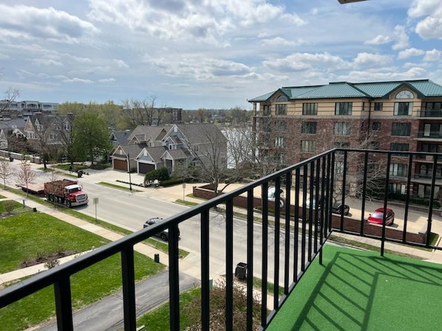 balcony featuring a residential view
