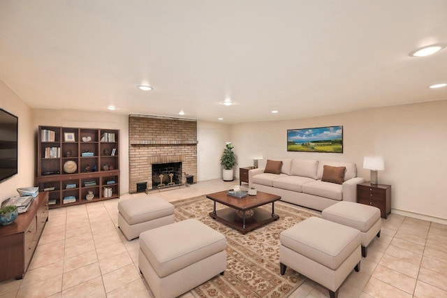 living area featuring recessed lighting, light tile patterned floors, and a fireplace