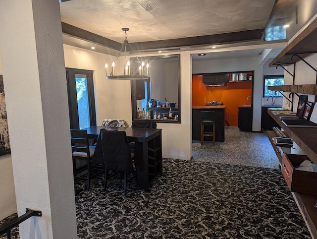 4464 S Whitnall Ave, Milwaukee, WI 53225 - dining area with carpet floors, a notable chandelier, and a healthy amount of sunlight