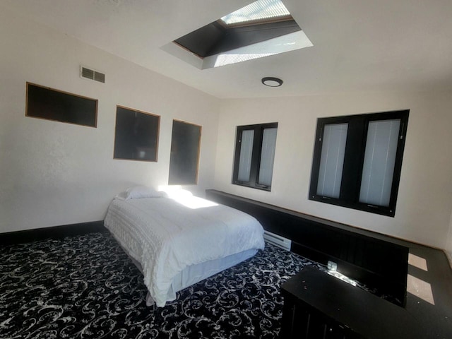 4464 S Whitnall Ave, Milwaukee, WI 53225 - bedroom featuring a skylight, carpet floors, and baseboards