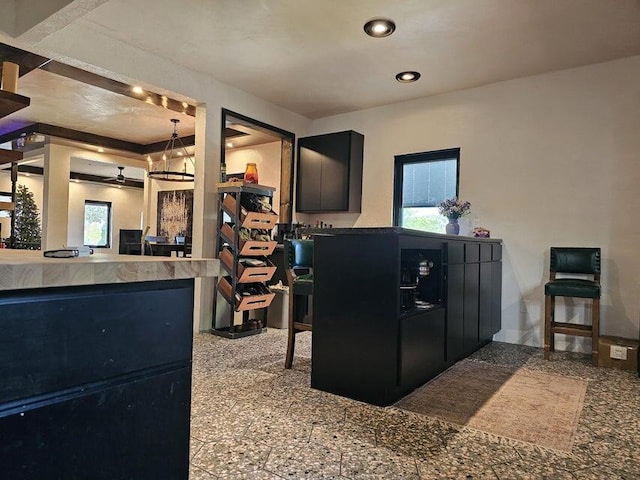 4464 S Whitnall Ave, Milwaukee, WI 53225 - interior space featuring recessed lighting, granite finish floor, a wealth of natural light, and dark cabinets