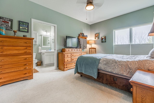 183 Twin Valley Trl, Cedar Grove, WI 53013 - carpeted bedroom featuring a ceiling fan and ensuite bath