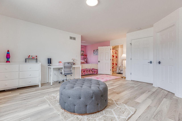 183 Twin Valley Trl, Cedar Grove, WI 53013 - living area with light wood-type flooring and visible vents