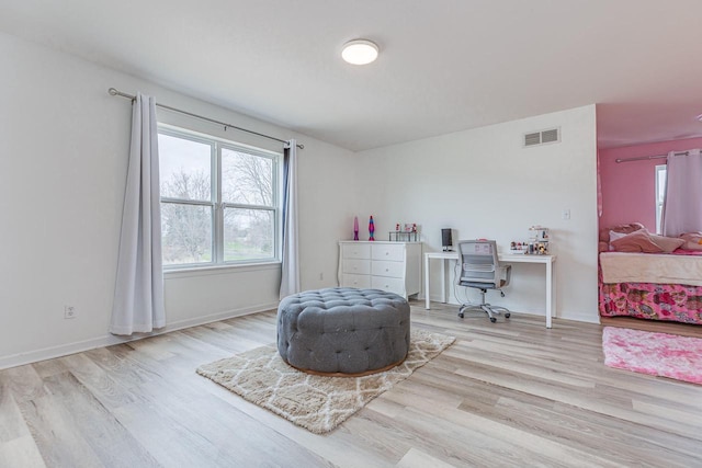 183 Twin Valley Trl, Cedar Grove, WI 53013 - sitting room featuring visible vents, baseboards, and wood finished floors