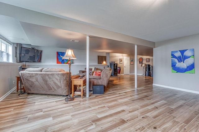 183 Twin Valley Trl, Cedar Grove, WI 53013 - living room with baseboards, light wood-style flooring, and visible vents