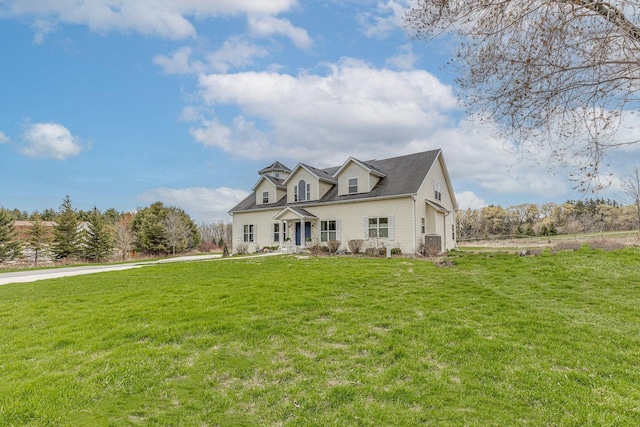 183 Twin Valley Trl, Cedar Grove, WI 53013 - view of front of house with central air condition unit and a front yard