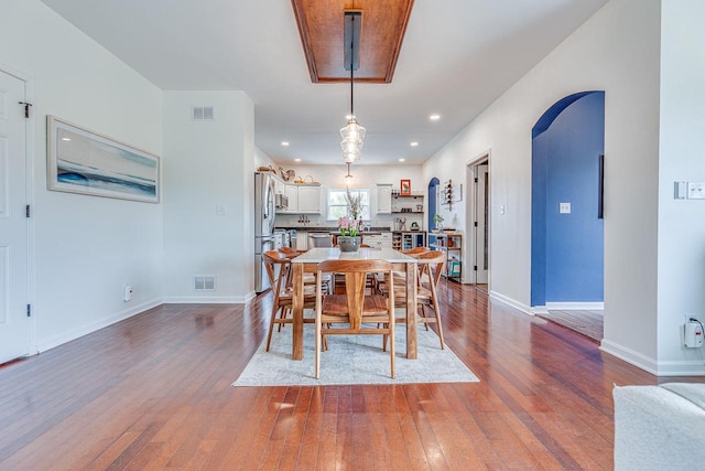 183 Twin Valley Trl, Cedar Grove, WI 53013 - dining space with visible vents, dark wood finished floors, and baseboards