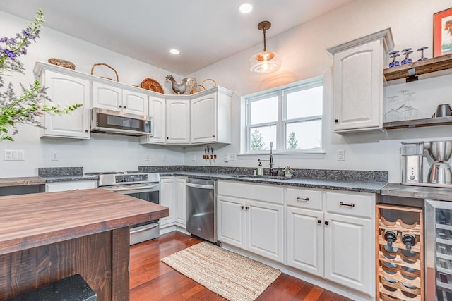 183 Twin Valley Trl, Cedar Grove, WI 53013 - kitchen featuring a sink, appliances with stainless steel finishes, butcher block counters, and white cabinetry
