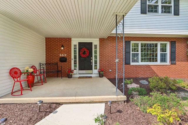 6614 Inner Dr, Madison, WI 53705 - entrance to property with covered porch and brick siding