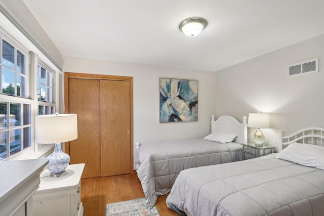 6614 Inner Dr, Madison, WI 53705 - bedroom featuring wood finished floors