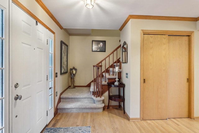 6614 Inner Dr, Madison, WI 53705 - foyer with stairway, light wood-style flooring, and ornamental molding