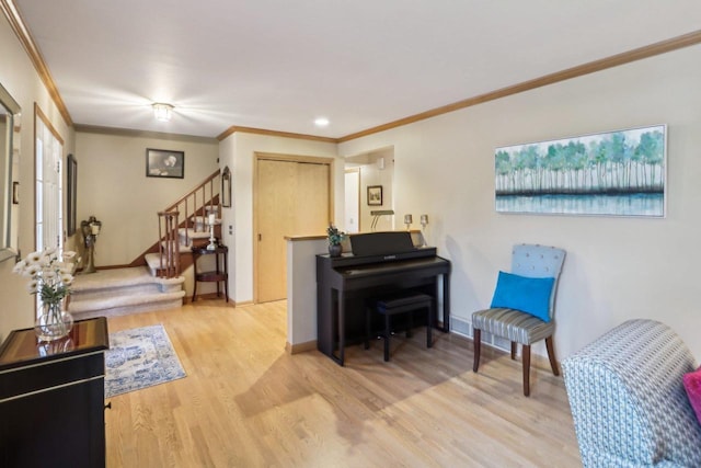 6614 Inner Dr, Madison, WI 53705 - living area with wood finished floors, stairway, ornamental molding, baseboards, and recessed lighting