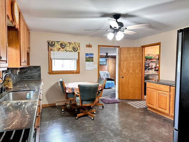 dining room featuring a ceiling fan and visible vents