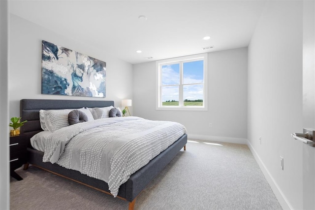 306 NW 3rd St, Monroe, WI 53566 - carpeted bedroom with baseboards, recessed lighting, and visible vents